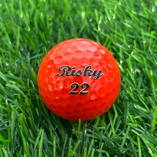 Customized Personalized Red Golf Balls in 2 lines Script MT Bold in color black