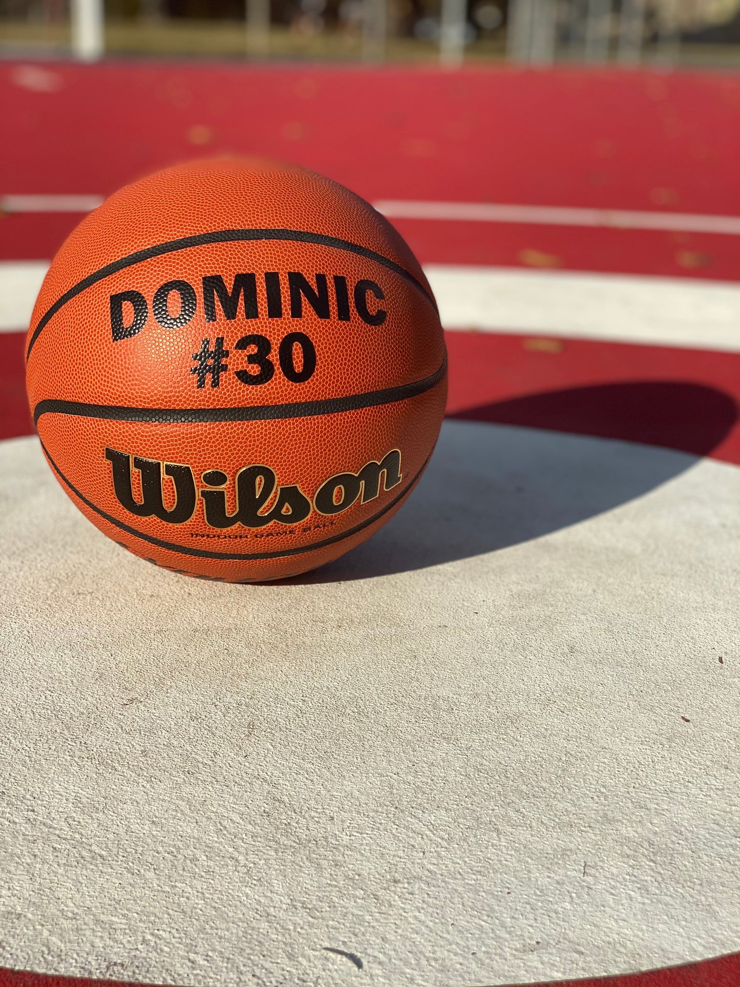 Customized Wilson Evolution Basketball Personalized with Custom Text in 2/Two lines in Black Color on Court