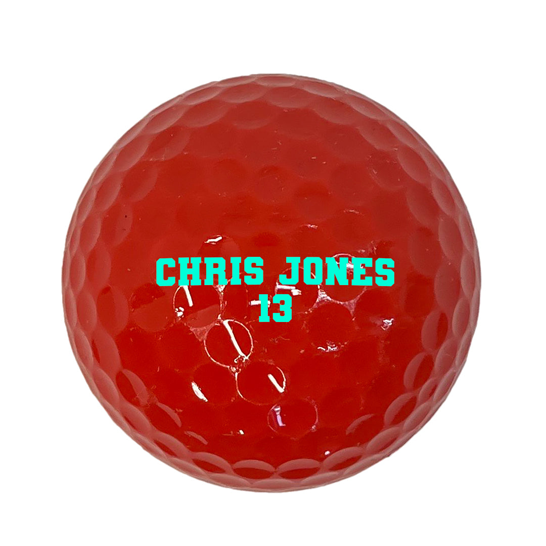 Customized Personalized Red Golf Balls  Varsity Team Font in 2 lines Glow in the dark