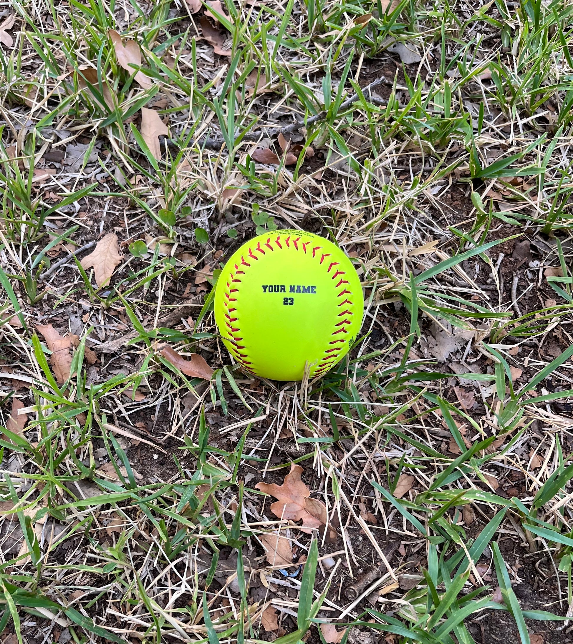 Customized Softball with Black Text and Background
