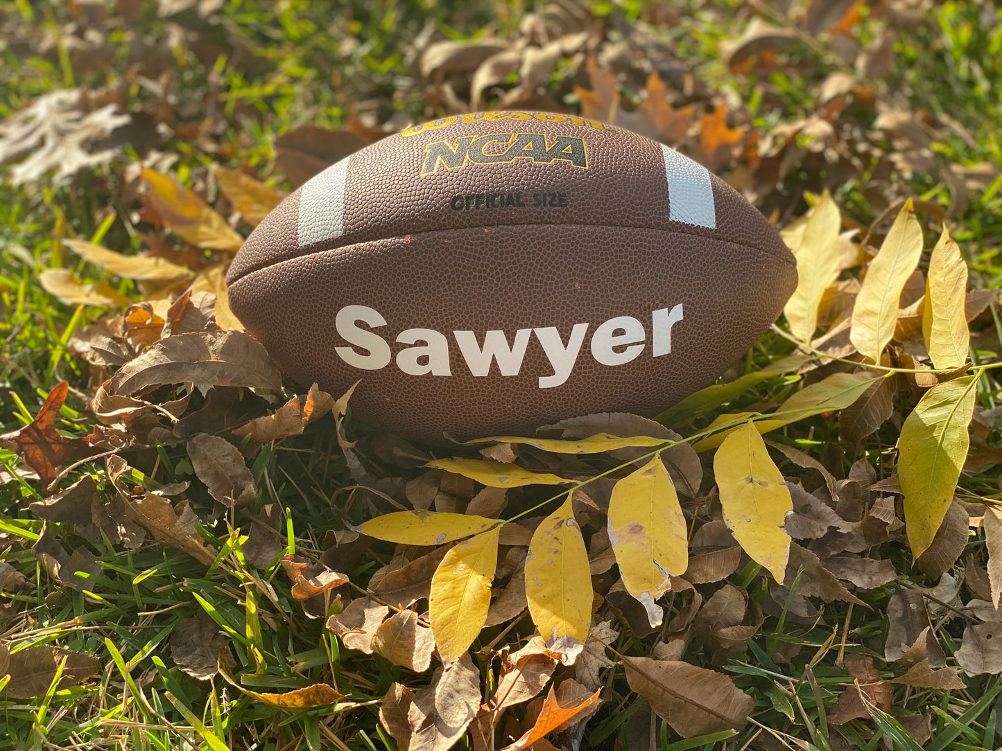 Custom Wilson NCAA Football with white custom text