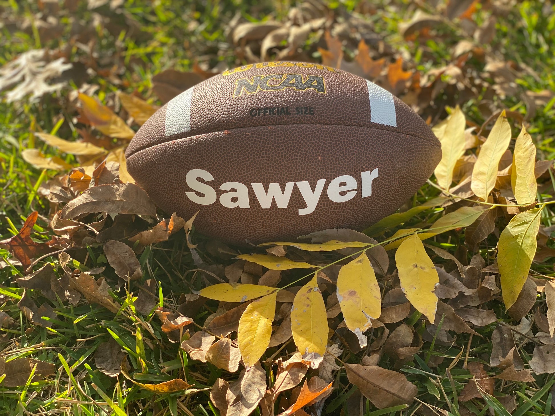Custom Wilson NCAA Football with white custom text